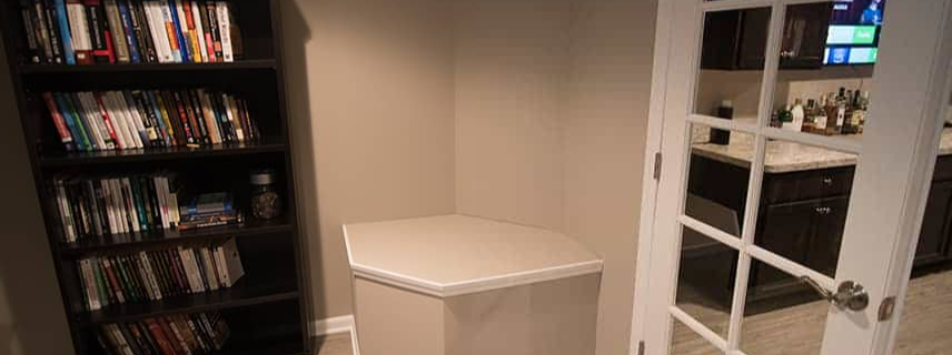 how to hide a sump pump in a finished basement